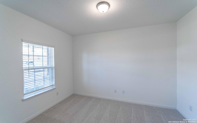 127 Gathering Dr, San Antonio, TX 78253 - unfurnished room with plenty of natural light, light carpet, and a textured ceiling