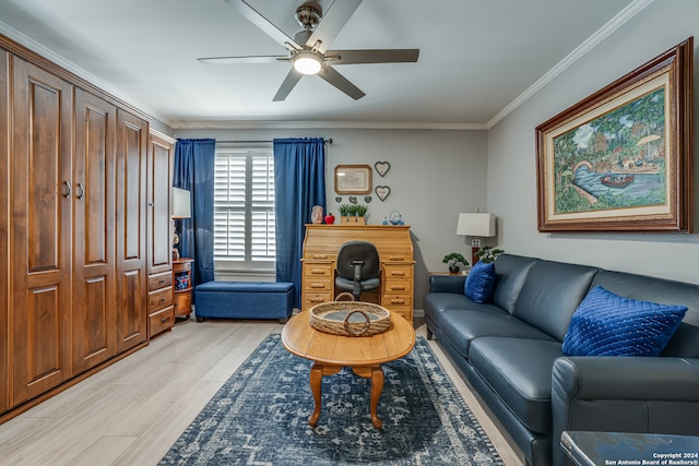 living room featuring light hardwood / wood-style floors, ceiling fan, and crown molding