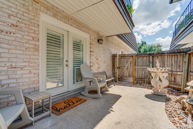 8058 Broadway Unit 147U, San Antonio, TX 78209 - view of patio / terrace with french doors and a gate