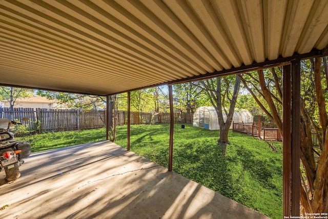 view of patio / terrace featuring an outbuilding