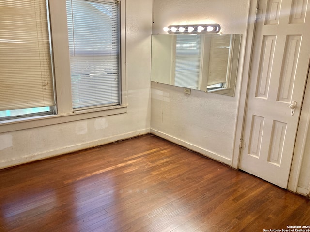 spare room featuring hardwood / wood-style flooring