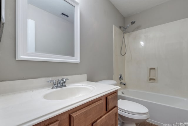 full bathroom featuring vanity, shower / bathing tub combination, and toilet