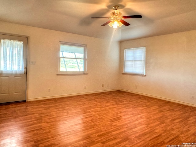 entryway with ceiling fan and light hardwood / wood-style flooring