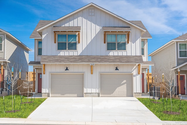 view of front facade with a front lawn and a garage