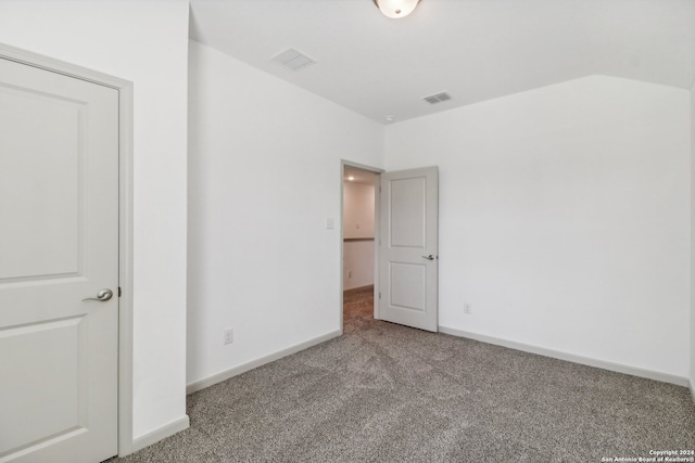 unfurnished bedroom with carpet flooring