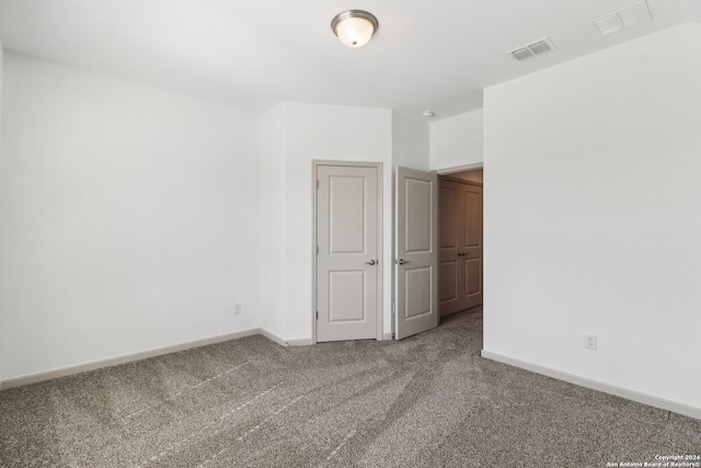 empty room with carpet floors