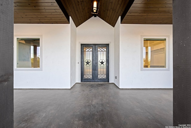 property entrance featuring french doors