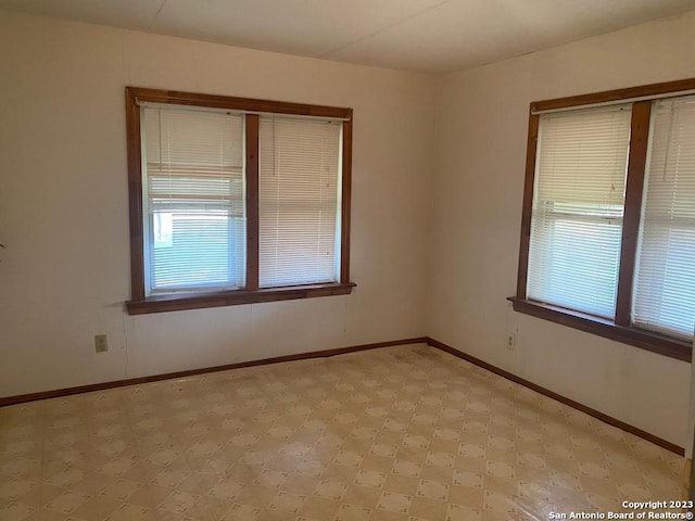 17770 Interstate 35, Lytle, TX 78052 - unfurnished room featuring plenty of natural light, light flooring, and baseboards