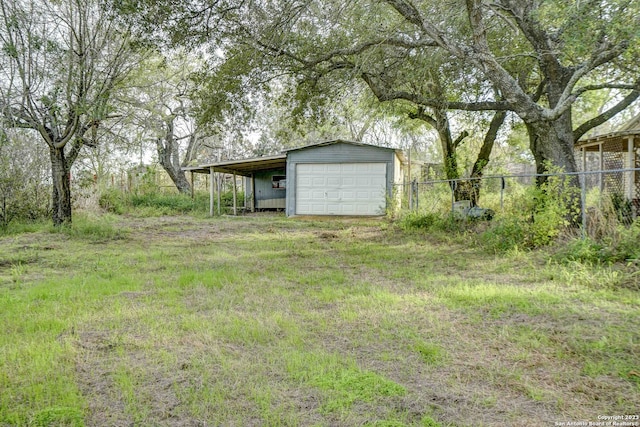 view of yard with a carport