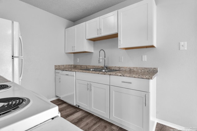 kitchen featuring white cabinets, white appliances, sink, and dark wood-type flooring