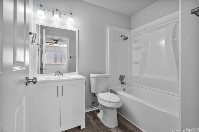 full bathroom featuring vanity, bathing tub / shower combination, ceiling fan, toilet, and wood-type flooring