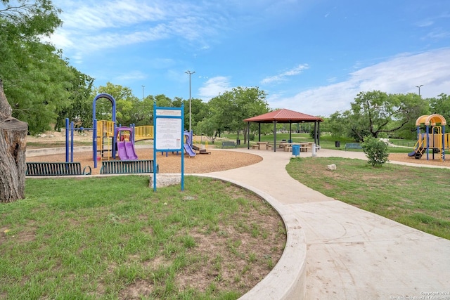 view of playground with a gazebo and a yard