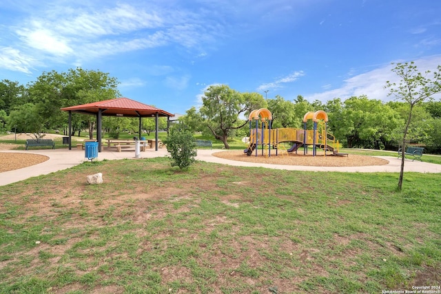 view of playground featuring a gazebo and a lawn