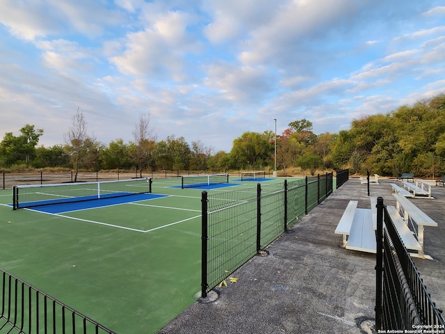 view of sport court with basketball hoop