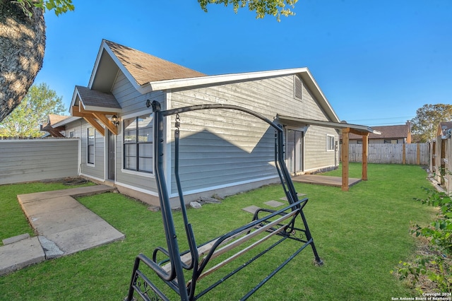 view of home's exterior featuring a lawn