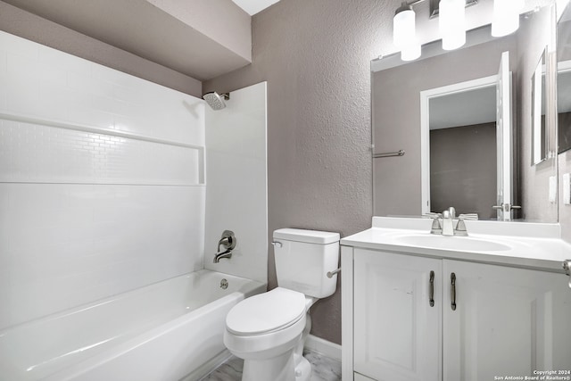 full bathroom with vanity,  shower combination, and toilet