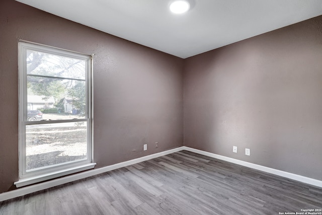 empty room featuring hardwood / wood-style floors