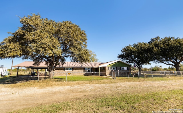 view of yard featuring a carport