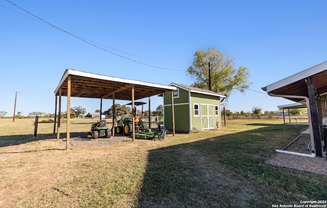 view of yard with a storage unit