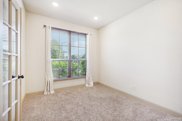 102 Santa Anita, Boerne, TX 78006 - carpeted empty room featuring plenty of natural light, recessed lighting, baseboards, and french doors