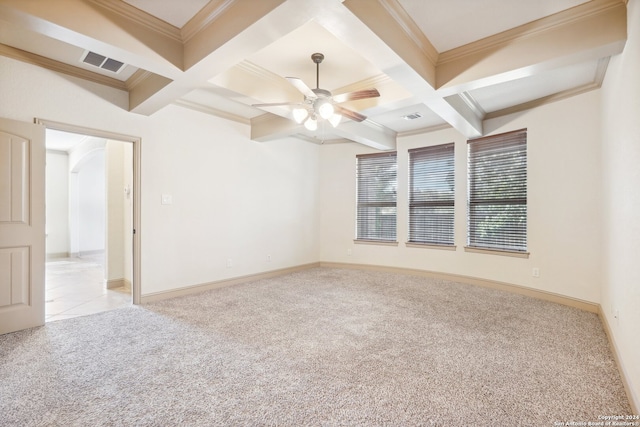 empty room with ceiling fan, beam ceiling, light colored carpet, and crown molding