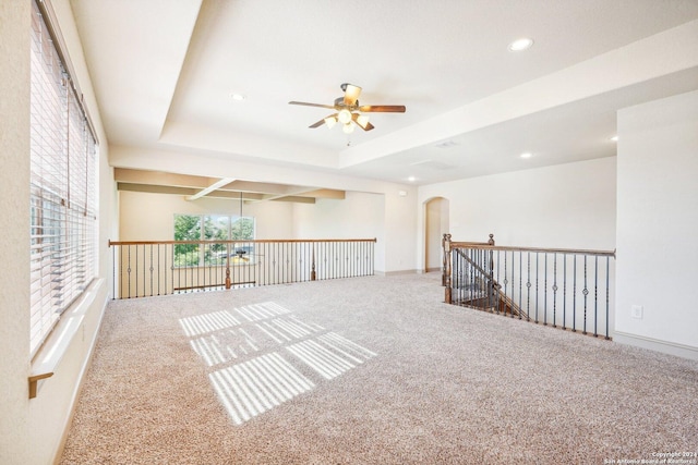 102 Santa Anita, Boerne, TX 78006 - carpeted empty room featuring ceiling fan, a raised ceiling, recessed lighting, and arched walkways