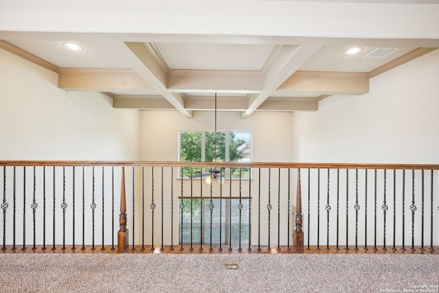 hallway with beamed ceiling, carpet, coffered ceiling, and ornamental molding