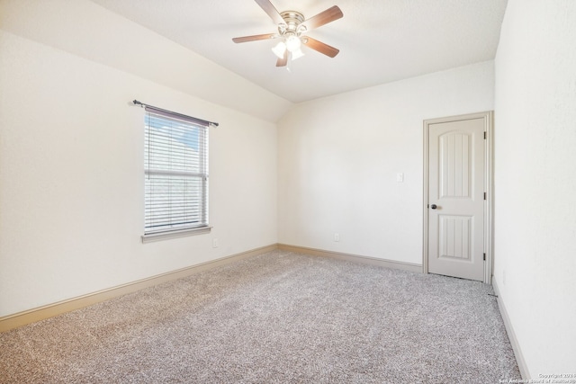 unfurnished room with carpet flooring, ceiling fan, and lofted ceiling