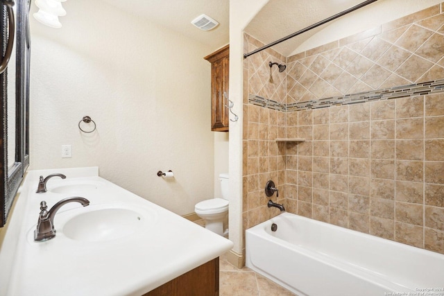 102 Santa Anita, Boerne, TX 78006 - bathroom featuring toilet, double vanity, bathing tub / shower combination, and tile patterned floors