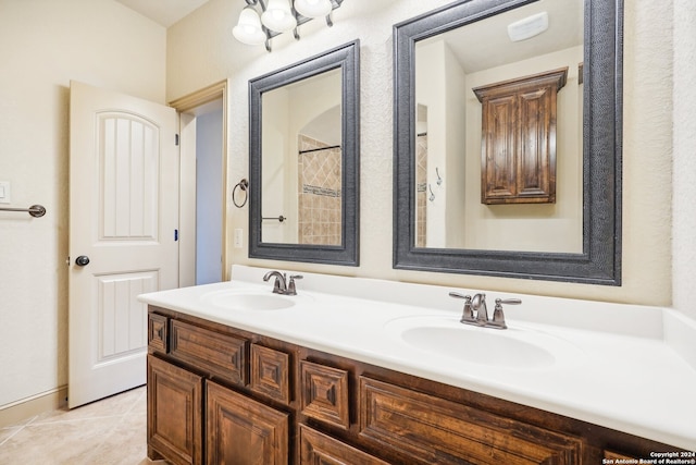 bathroom with tile patterned floors and vanity