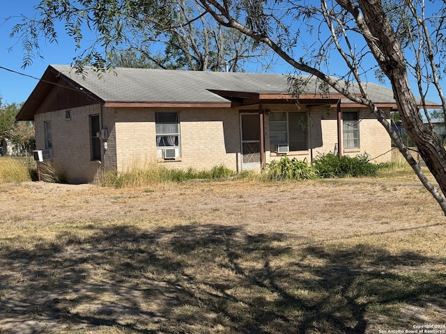 exterior space featuring cooling unit