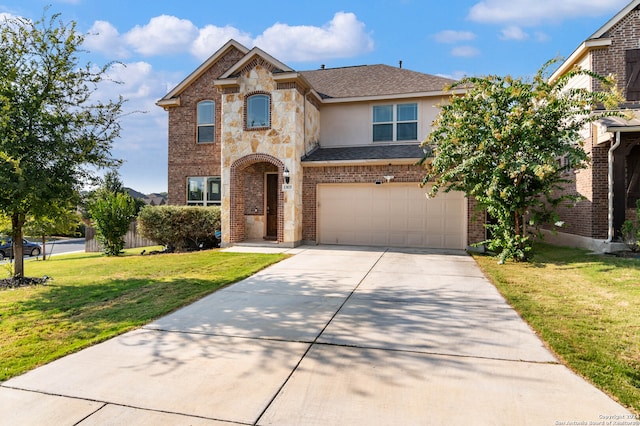 view of front property featuring a garage and a front lawn