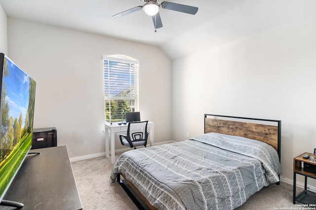 carpeted bedroom featuring ceiling fan and lofted ceiling