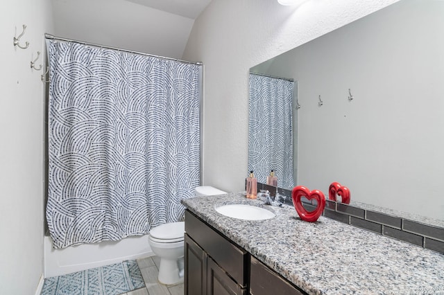 full bathroom with shower / bath combo, vanity, vaulted ceiling, tile patterned flooring, and toilet