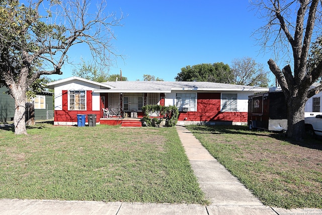 single story home with covered porch and a front yard