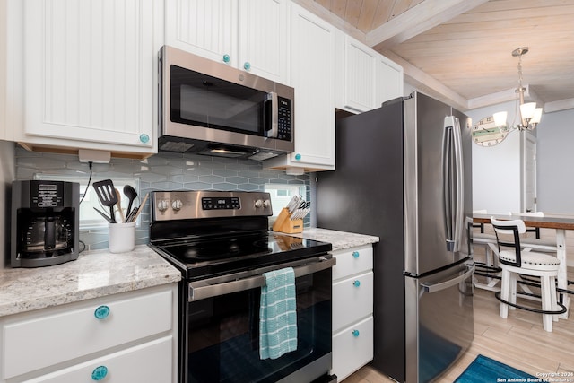 kitchen featuring white cabinetry, light stone countertops, appliances with stainless steel finishes, light hardwood / wood-style floors, and wood ceiling