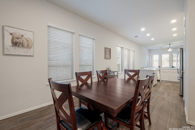 dining space featuring ceiling fan and hardwood / wood-style floors