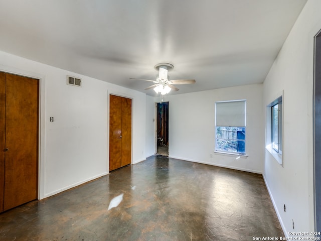 unfurnished room featuring ceiling fan