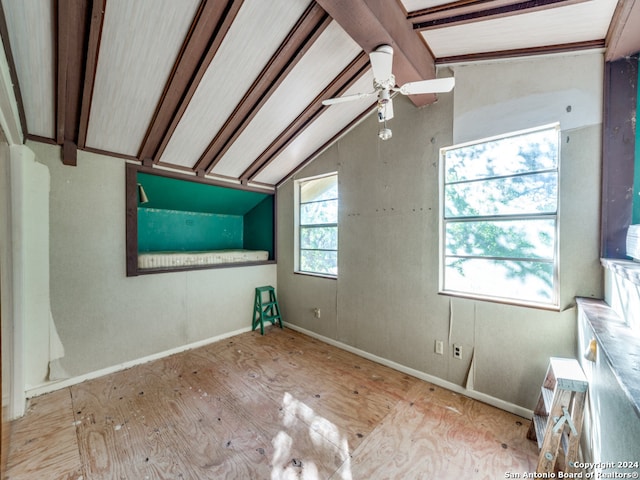 additional living space with a wealth of natural light, light hardwood / wood-style flooring, ceiling fan, and vaulted ceiling