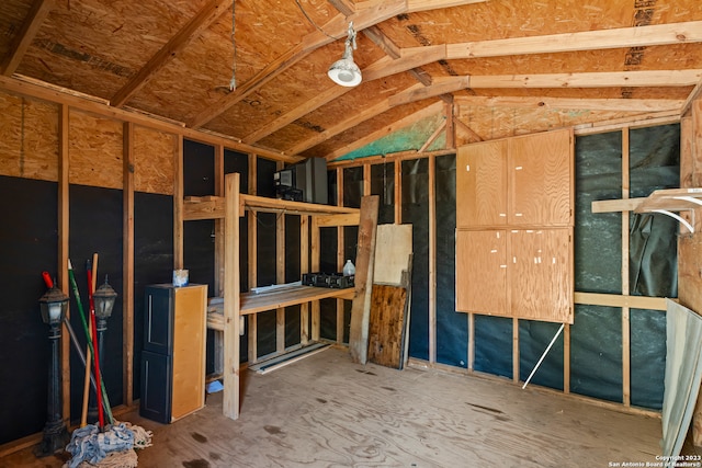 interior space featuring lofted ceiling