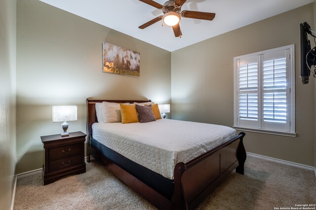 bedroom featuring carpet and ceiling fan