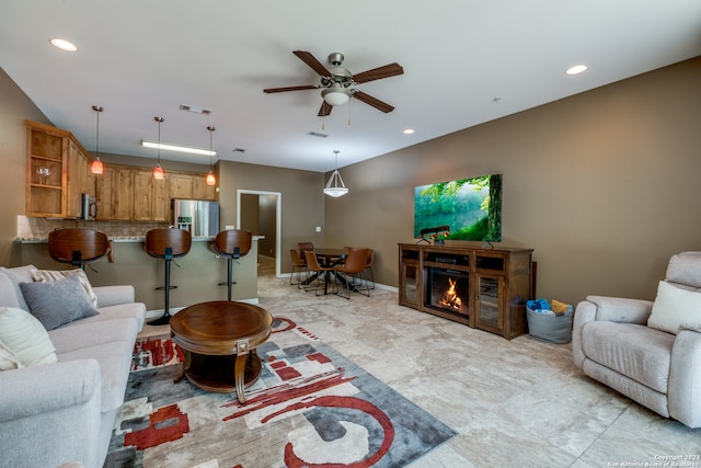 living room featuring ceiling fan