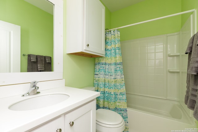 full bathroom with shower / bath combo, vanity, and toilet