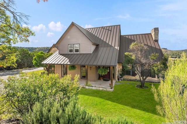 exterior space featuring a front yard