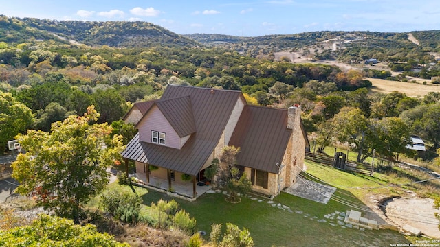 drone / aerial view featuring a mountain view