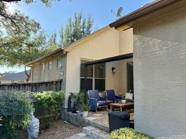 exterior space with a patio area and an outdoor hangout area