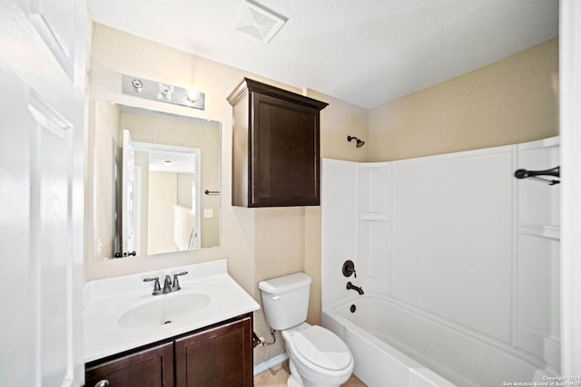 full bathroom with shower / bathing tub combination, vanity, and toilet