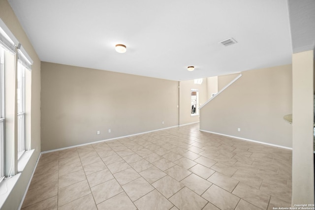 view of tiled spare room