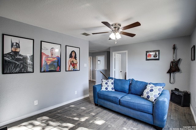 living room with hardwood / wood-style floors and ceiling fan