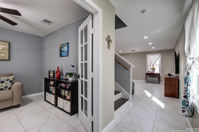 interior space with a textured ceiling